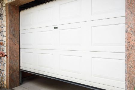 Your Guide to Fixing a Stubborn Garage Door